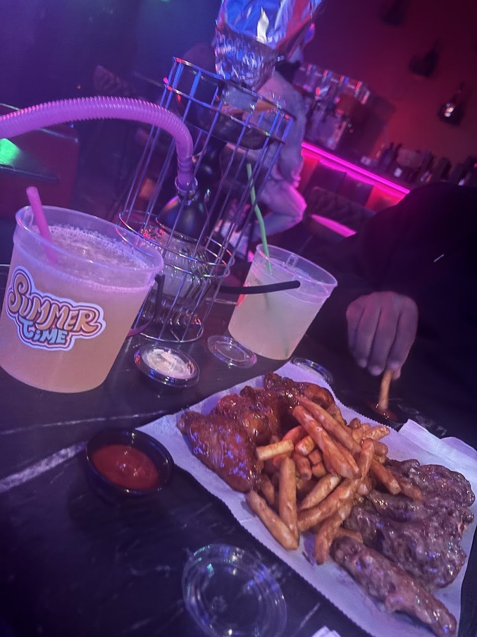 Printed menu with drinks and late-night bites.