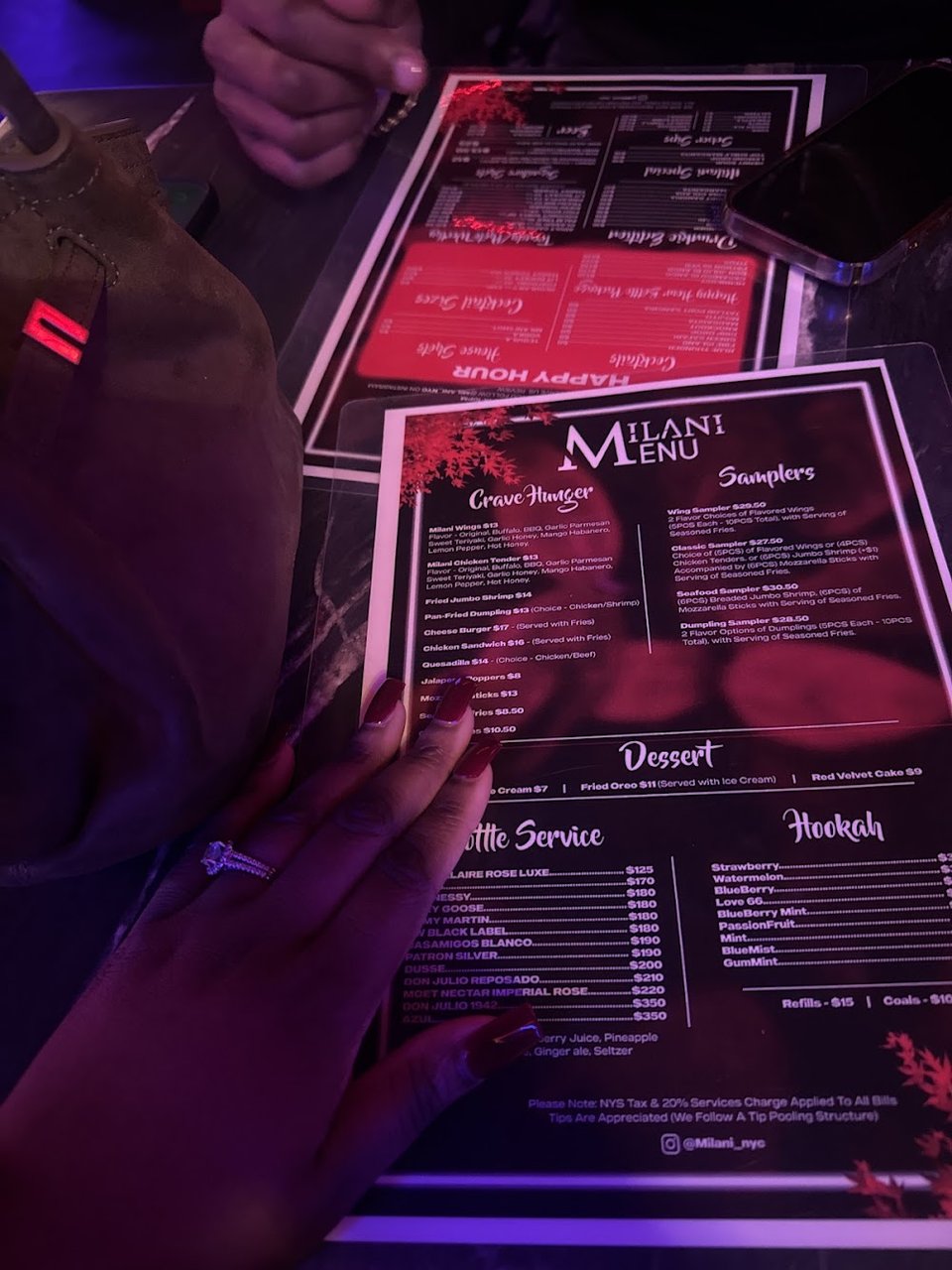 Restaurant menu featuring cocktails and small plates.