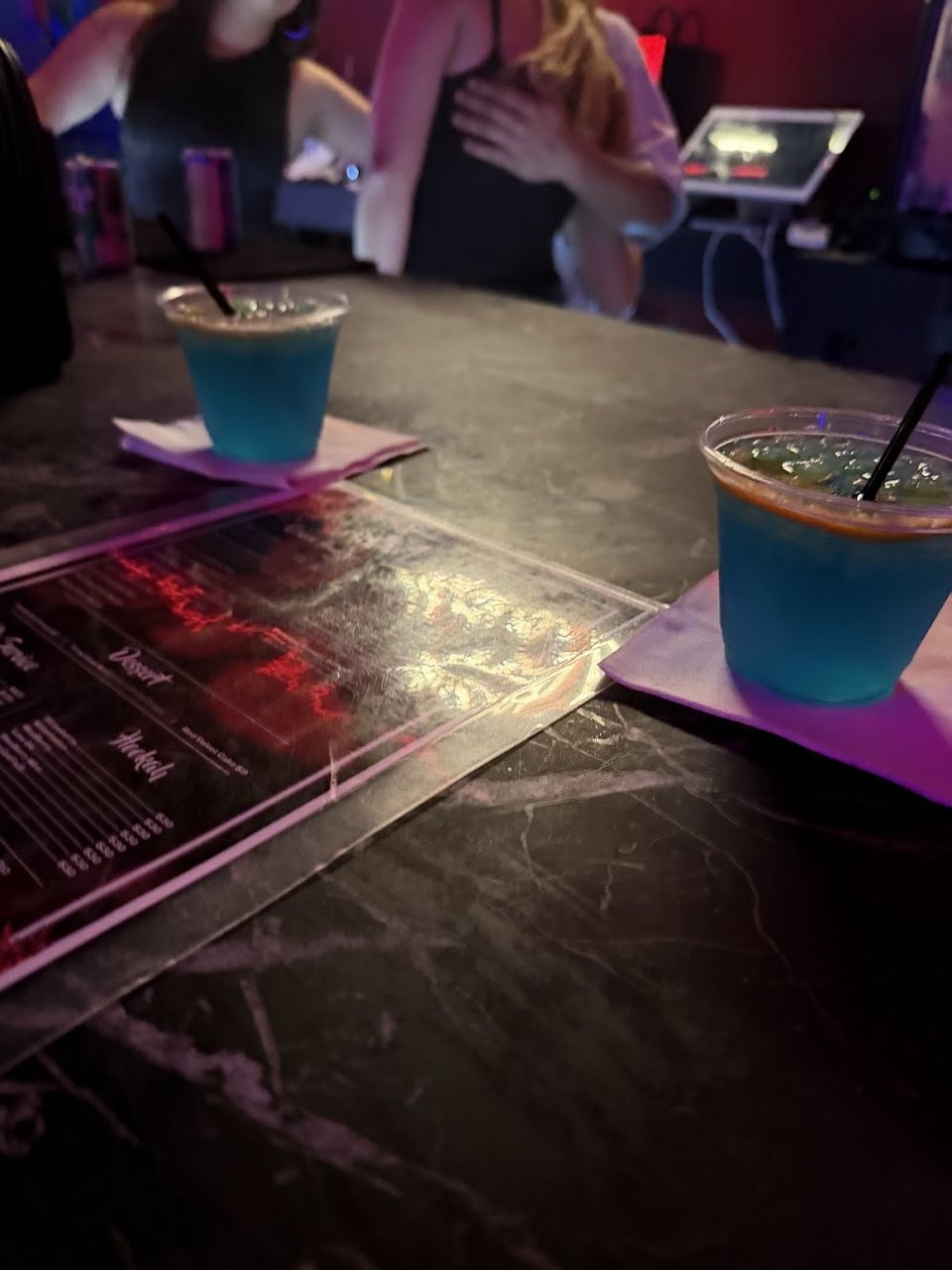 Blue Cocktails on Marble Bar Counter